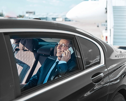 A person comfortable and stays cool inside luxury car