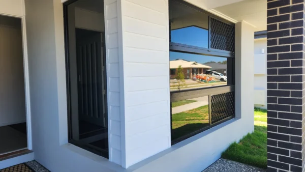 Home window tinting in Brisbane on a front window with privacy and glare reduction film installed by Glass Tinting Solutions