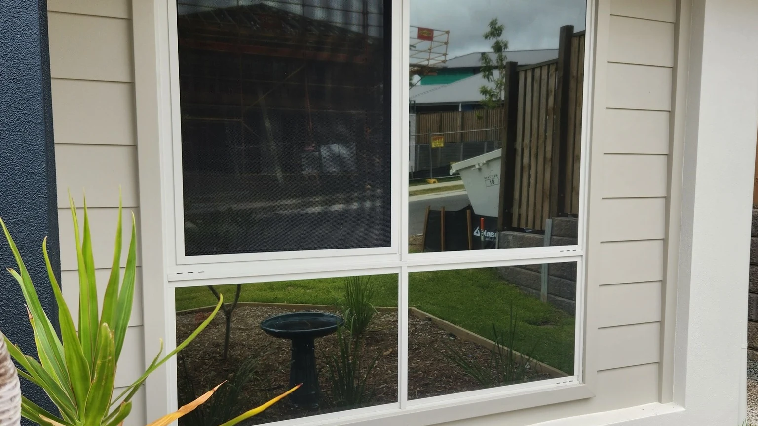 Residential window tinting in Brisbane with privacy window film on a front home window installed by Glass Tinting Solutions