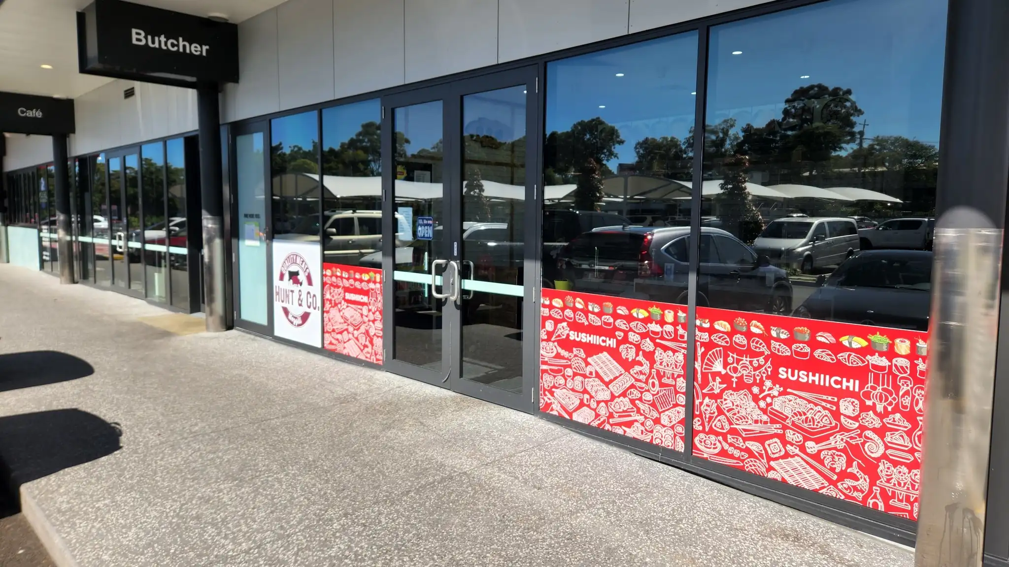 Shopfront window tinting in Brisbane for a retail frontage with privacy and glare reduction film by Glass Tinting Solutions