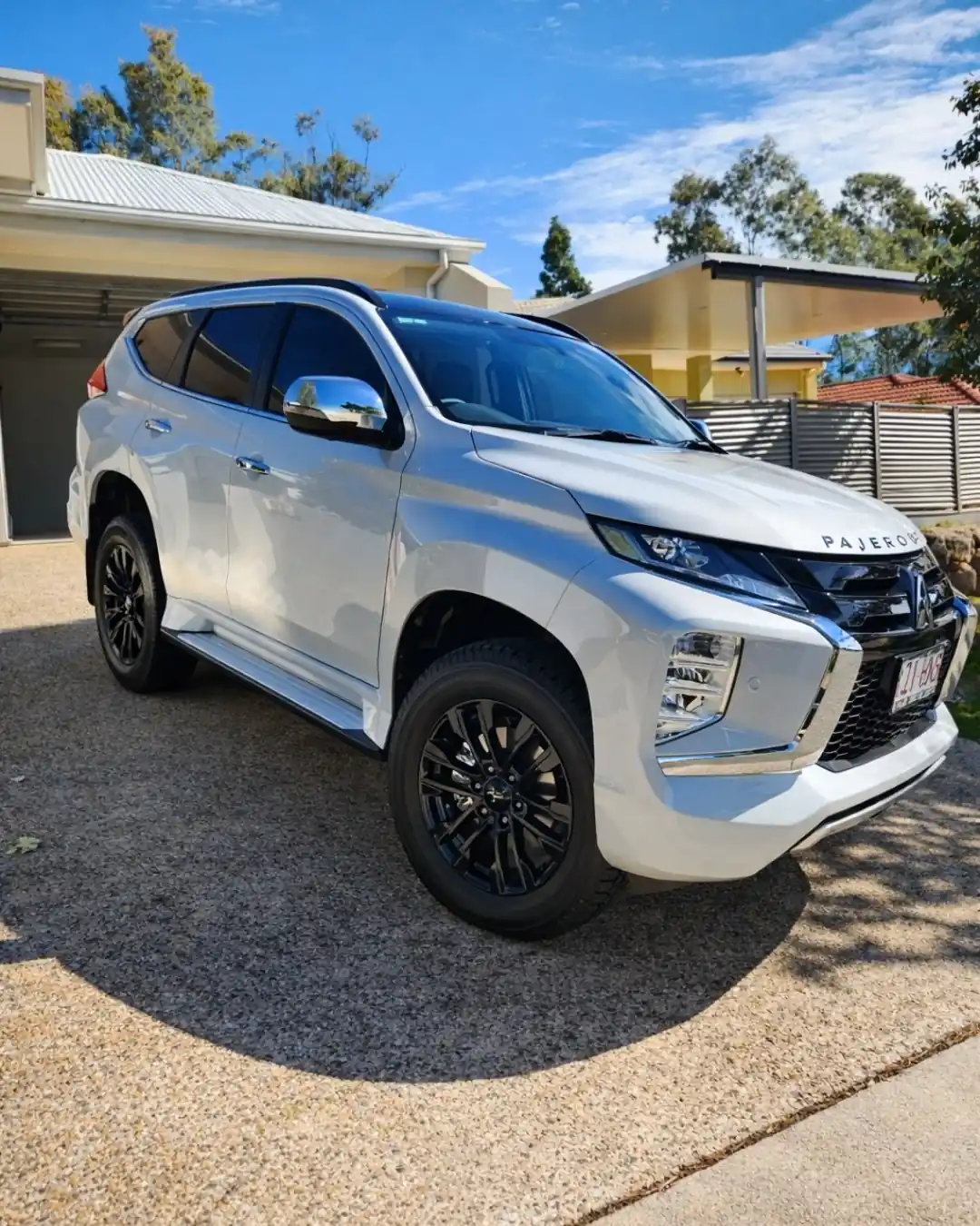 White SUV with ceramic paint protection in Brisbane by GTS showing a clean glossy finish outdoors